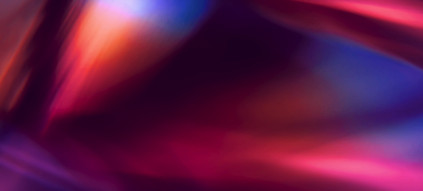 Abstract gradient background with flowing red, magenta, and indigo light streaks.